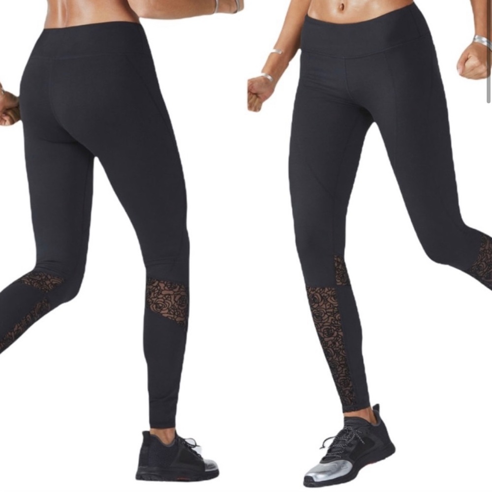 Fabletics Avon leggings. Black with rose mesh detailing around shins.